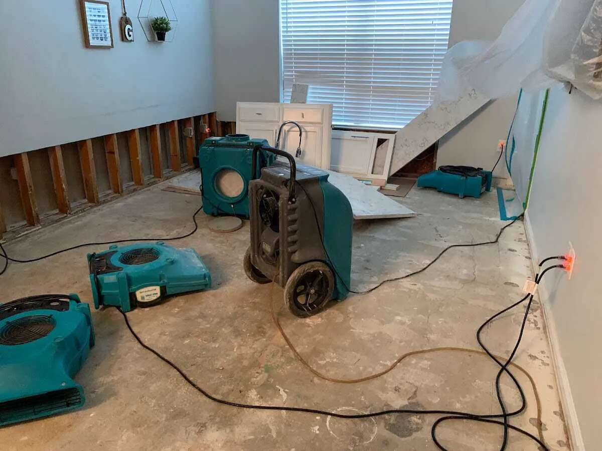 Dehumidifier in flood-cut room for Water Damage Restoration in Park Hills